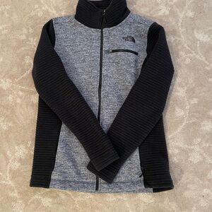 The North Face women’s Black and Gray zip up Jacket
